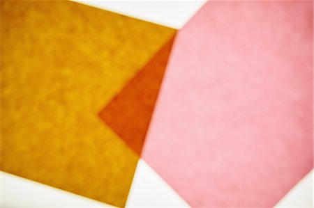 rectangle - Two pieces of recycled construction paper,  brown and pink with a small overlapping triangle. Stock Photo - Premium Royalty-Free, Code: 6118-07440705