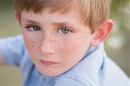 freckles - A young boy with freckles on his face. Stock Photo - Premium Royalty-Free, Code: 6118-07731951