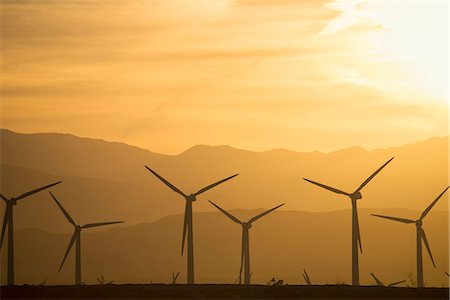 simsearch:6118-07352742,k - A group of wind power turbines in the sunset. Stock Photo - Premium Royalty-Free, Code: 6118-08023737