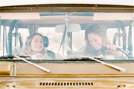 simsearch:6118-08140197,k - Two women on an outing in the desert, driving in a 4x4. Stock Photo - Premium Royalty-Free, Code: 6118-08140179
