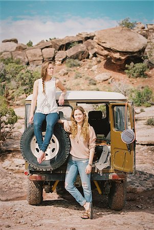 simsearch:6118-08140197,k - Two women standing by a 4x4 on a mountain road. Stock Photo - Premium Royalty-Free, Code: 6118-08140183
