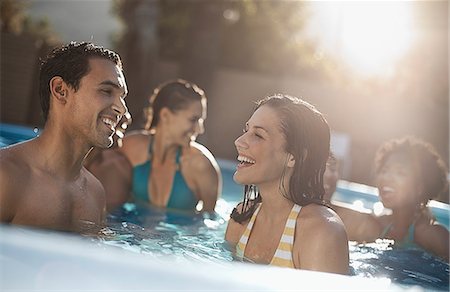 pool party - A group of young men and women in the swimming pool at the end of a hot day. Stock Photo - Premium Royalty-Free, Code: 6118-08488103