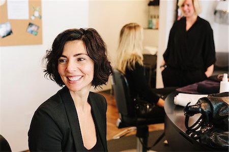 simsearch:6118-08660009,k - A client sitting in a hair salon chair. Stock Photo - Premium Royalty-Free, Code: 6118-08660004