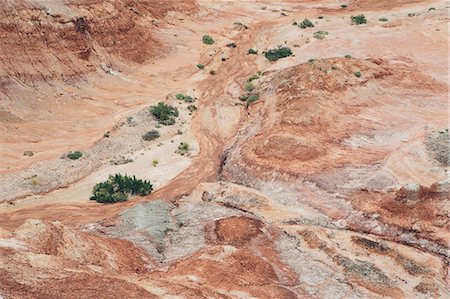 simsearch:6118-07353866,k - The Bentonite Hills of Cathedral Valley, coloured rock strata and formations of the Cainville Wash in Capitol Reef national park in Utah. Stock Photo - Premium Royalty-Free, Code: 6118-08947918
