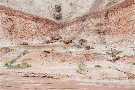 simsearch:6118-07353866,k - The Bentonite Hills of Cathedral Valley, coloured rock strata and formations of the Cainville Wash in Capitol Reef national park in Utah. Stock Photo - Premium Royalty-Free, Code: 6118-08947919