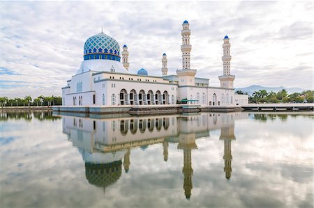 simsearch:877-08897949,k - Exterior view of mosque with white washed facade and blue dome reflected in a pond. Stock Photo - Premium Royalty-Free, Code: 6118-09076680