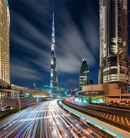 simsearch:649-07710289,k - Cityscape of Dubai, United Arab Emirates at dusk, with skyscrapers, illuminated Burj Kalifa in the centre. Stock Photo - Premium Royalty-Free, Code: 6118-09028246