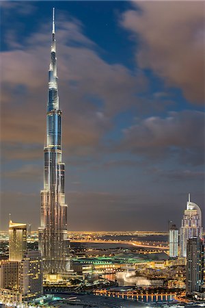 simsearch:649-07710289,k - Cityscape of Dubai, United Arab Emirates, with illuminated Burj Khalifa skyscraper in the foreground. Stock Photo - Premium Royalty-Free, Code: 6118-09028256