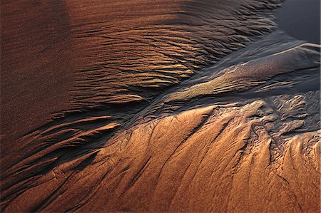 High angle close up of patterns in beach sand at dusk. Foto de stock - Sin royalties Premium, Código: 6118-09112074