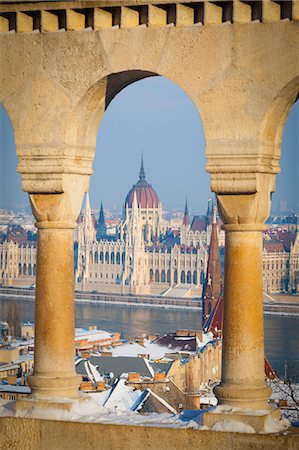 Hungarian Parliament illuminated by warm light on a winters afternoon, Budapest, Hungary, Europe Stock Photo - Premium Royalty-Free, Code: 6119-07451507