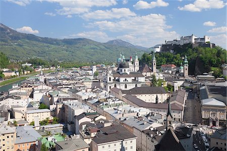 High angle view of the old town with Hohensalzburg Fortress, Dom Cathedral and Kappuzinerkirche Church, UNESCO World Heritage Site, Salzburg, Salzburger Land, Austria, Europe Stock Photo - Premium Royalty-Free, Code: 6119-07451852