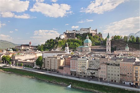 High angle view of the old town with Hohensalzburg Fortress, Dom Cathedral and Kappuzinerkirche Church, UNESCO World Heritage Site, Salzburg, Salzburger Land, Austria, Europe Stock Photo - Premium Royalty-Free, Code: 6119-07451854