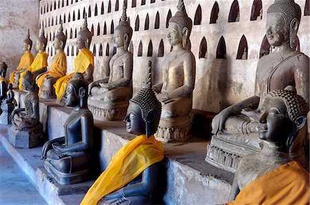 simsearch:841-06341159,k - Buddha statues in the cloister or gallery surrounding the sim, Wat Sisaket, Vientiane, Laos, Indochina, Southeast Asia, Asia Stock Photo - Premium Royalty-Free, Code: 6119-07452325