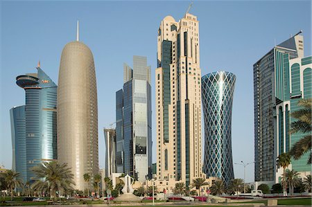 futuristic city - Futuristic skyscrapers downtown in Doha, Qatar, Middle East Stock Photo - Premium Royalty-Free, Code: 6119-07452729