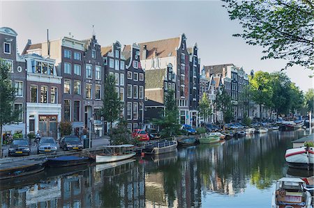 Houses by a canal, Amsterdam, The Netherlands, Europe Stock Photo - Premium Royalty-Free, Code: 6119-07587474