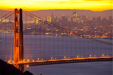 san francisco skyline - The Golden Gate Bridge and San Francisco skyline at sunrise, San Francisco, California, United States of America, North America Stock Photo - Premium Royalty-Free, Code: 6119-07651832