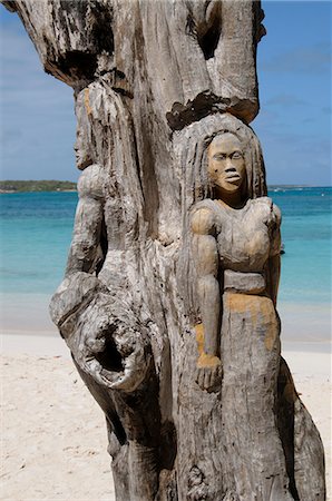 Wooden tree sculpture, Long Bay, Antigua, Leeward Islands, West Indies, Caribbean, Central America Foto de stock - Sin royalties Premium, Código: 6119-07651914