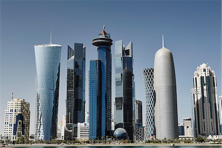 Downtown Doha with its impressive skyline of skyscrapers, Doha, Qatar, Middle East Stock Photo - Premium Royalty-Free, Code: 6119-07652107