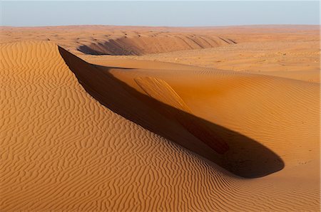 sands and desert and nobody and landscape - Wahiba Sands desert, Oman, Middle East Stock Photo - Premium Royalty-Free, Code: 6119-07845580