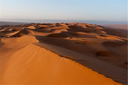 sands and desert and nobody and landscape - Wahiba Sands desert, Oman, Middle East Stock Photo - Premium Royalty-Free, Code: 6119-07943889