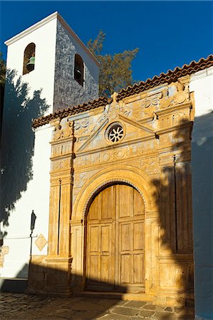 simsearch:841-07913791,k - Bell tower and ornate doorway of the late 17th century Church of Nuestra Senora de la Regla, Pajara, Fuerteventura, Canary Islands, Spain, Atlantic, Europe Foto de stock - Sin royalties Premium, Código: 6119-07944068
