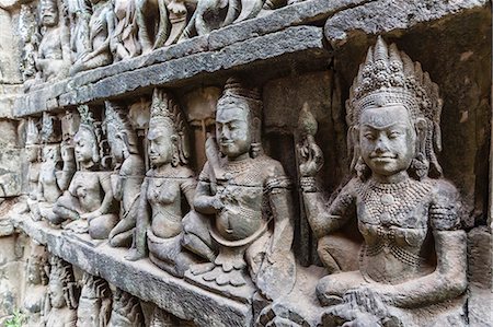Apsara carvings in the Leper King Terrace in Angkor Thom, Angkor, UNESCO World Heritage Site, Cambodia, Indochina, Southeast Asia, Asia Stock Photo - Premium Royalty-Free, Code: 6119-08061941