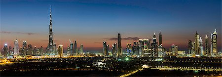 Elevated view of the new Dubai skyline, the Burj Khalifa, modern architecture and skyscrapers on Sheikh Zayed Road, Dubai, United Arab Emirates, Middle East Stock Photo - Premium Royalty-Free, Code: 6119-08081164