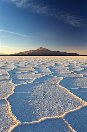 simsearch:841-06449731,k - An Andean volcano rises above the Salar de Uyuni, the incredible salt desert, during a summer sunset, Oruro, Bolivia, South America Stock Photo - Premium Royalty-Free, Code: 6119-08081129