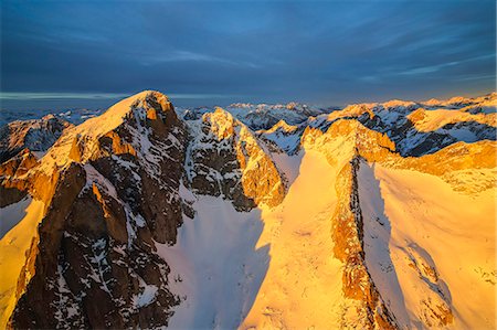 Aerial view of peak Cengalo at sunset, Masino Valley, Valtellina, Lombardy, Italy, Europe Stock Photo - Premium Royalty-Free, Code: 6119-08242884