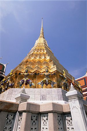 designs for decoration of pillars - Golden spire, Temple of the Emerald Buddha (Wat Phra Kaew) in the Grand Palace, Bangkok, Thailand, Southeast Asia, Asia Stock Photo - Premium Royalty-Free, Code: 6119-08266284