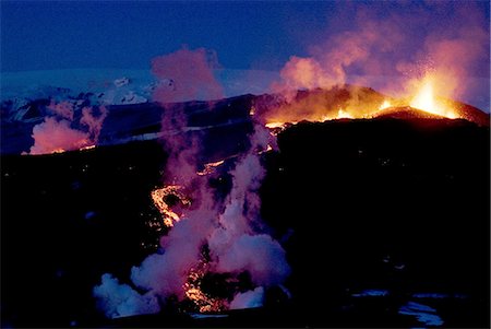 fire hazard - Night view of lava flowing down from Eyjafjallajokull volcano, Iceland, Polar Regions Stock Photo - Premium Royalty-Free, Code: 6119-08267334