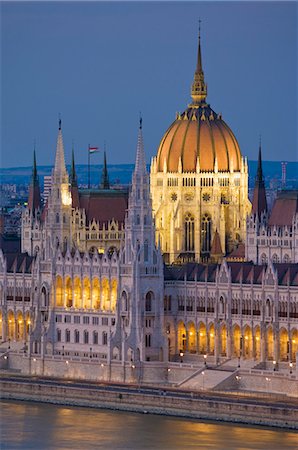The neo-gothic Hungarian Parliament building, designed by Imre Steindl, illuminated at night, and the River Danube, UNESCO World Heritage Site, Budapest, Hungary, Europe Stock Photo - Premium Royalty-Free, Code: 6119-08267416