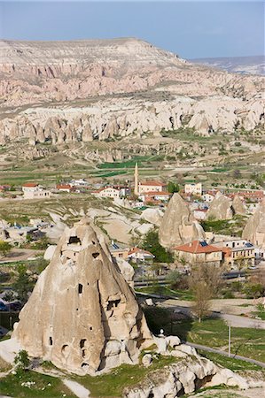 Elevated view over the volcanic tufa rock formations surrounding Goreme, Cappadocia, Anatolia, Turkey, Asia Minor, Eurasia Stock Photo - Premium Royalty-Free, Code: 6119-08269349