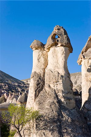 fairy chimney - Phallic pillars known as fairy chimneys in the valley known as Love Valley near Goreme in Cappadocia, Anatolia, Turkey, Asia Minor, Eurasia Stock Photo - Premium Royalty-Free, Code: 6119-08269361