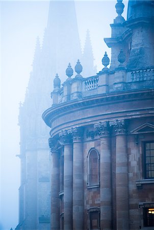 Radcliffe Camera and St. Mary's Church in the mist, Oxford, Oxfordshire, England, United Kingdom, Europe Stock Photo - Premium Royalty-Free, Code: 6119-08420444