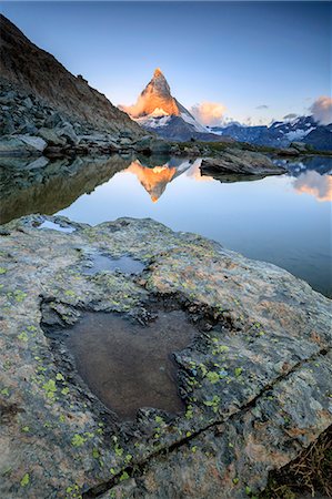 pennine alps - The Matterhorn reflected in Lake Stellisee at dawn, Zermatt, Pennine Alps, Canton of Valais, Swiss Alsp, Switzerland, Europe Stock Photo - Premium Royalty-Free, Code: 6119-08420433