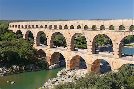 french famous landmarks - Pont du Gard, Roman aqueduct, UNESCO World Heritage Site, River Gard, Languedoc-Roussillon, France, Europe Stock Photo - Premium Royalty-Free, Code: 6119-08517993