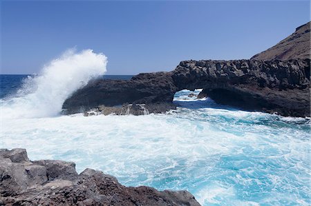 rock arch - Rock arch, Charco Manso Bay, Punta Norte near Echedo, UNESCO biosphere reserve, El Hierro, Canary Islands, Spain, Atlantic, Europe Stock Photo - Premium Royalty-Free, Code: 6119-08518021