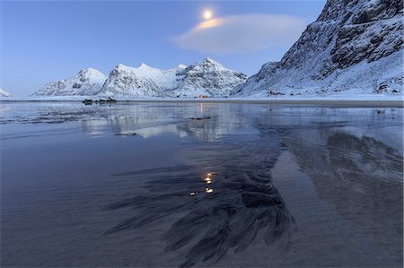 sublimation - Full moon reflected in the icy sea around the surreal Skagsanden beach, Flakstad, Nordland county, Lofoten Islands, Arctic, Norway, Scandinavia, Europe Stock Photo - Premium Royalty-Free, Code: 6119-08658024