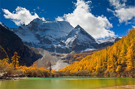 Xiannairi mountain and Pearl Lake, Yading Nature Reserve, Sichuan Province, China, Asia Stock Photo - Premium Royalty-Free, Code: 6119-08740947