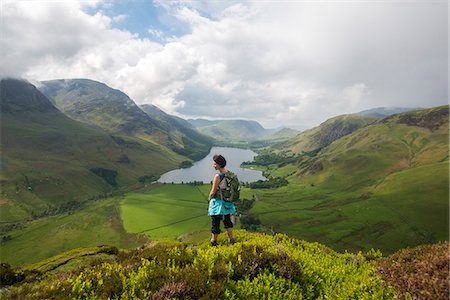 simsearch:841-07590500,k - A woman looks out over Buttermere from Fleetwith Pike, Lake District National Park, Cumbria, England, United Kingdom, Europe Stock Photo - Premium Royalty-Free, Code: 6119-08797426