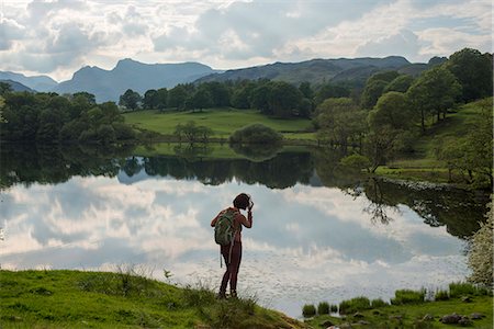 simsearch:841-07590500,k - A woman looks out over Tarn Foot, Lake District National Park, Cumbria, England, United Kingdom, Europe Stock Photo - Premium Royalty-Free, Code: 6119-08797428