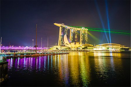 simsearch:6119-07443725,k - The nightly light and laser show in Marina Bay from the Marina Bay Sands, Singapore, Southeast Asia, Asia Stock Photo - Premium Royalty-Free, Code: 6119-08725031