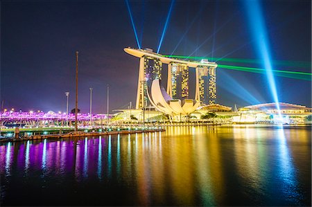 simsearch:6119-07443725,k - The nightly light and laser show in Marina Bay from the Marina Bay Sands, Singapore, Southeast Asia, Asia Stock Photo - Premium Royalty-Free, Code: 6119-08725032