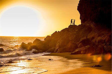 female silhouettes heart - Young couple, Malibu, California, United States of America, North America Stock Photo - Premium Royalty-Free, Code: 6119-09054127