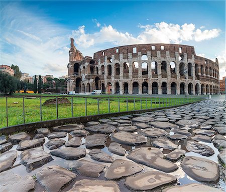 Blue sky at sunrise frames the ancient Colosseum (Flavian Amphitheatre), UNESCO World Heritage Site, Rome, Lazio, Italy, Europe Stock Photo - Premium Royalty-Free, Code: 6119-09073960