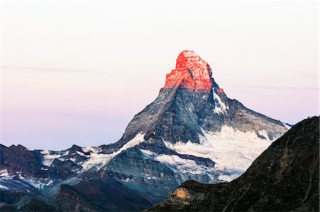 The Matterhorn, 4478m, at sunrise, Zermatt, Valais, Swiss Alps, Switzerland, Europe Stock Photo - Premium Royalty-Free, Code: 6119-09074796