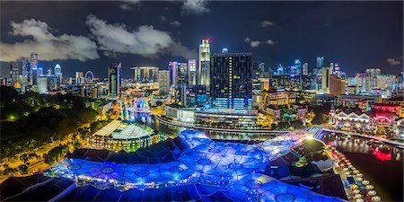 City skyline and riverside restaurants at the entertainment district of Clarke Quay, Singapore, Southeast Asia, Asia Stock Photo - Premium Royalty-Free, Code: 6119-09074922