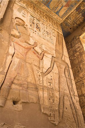 simsearch:700-03445950,k - Columns in the portico of the Second Court, Temple of Ramesses III at Medinet Habu, West Bank, UNESCO World Heritage Site, Luxor, Egypt, North Africa, Africa Stock Photo - Premium Royalty-Free, Code: 6119-09085465