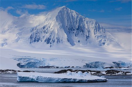 polar region - Misty Mount William, glaciers and icebergs, sunny weather, Anvers Island, from Bismarck Strait, Antarctic Peninsula, Antarctica, Polar Regions Stock Photo - Premium Royalty-Free, Code: 6119-09156439